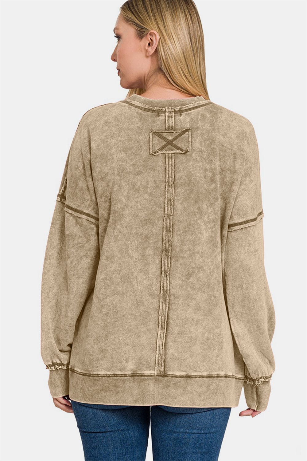 "Unique Kulture Exposed Seam Round Neck Dropped Shoulder Sweatshirt in a soft cotton fabric, featuring exposed seam details and a relaxed dropped shoulder design, perfect for casual wear.