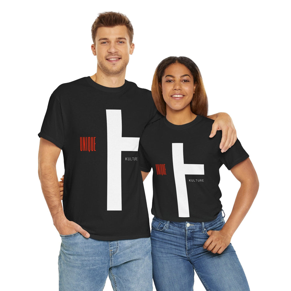 A unisex heavy cotton t-shirt featuring a stylized cross design on the front. The shirt is displayed on a plain background, showcasing its classic crew neck and short sleeves. The cross design is prominent and artistically rendered, blending faith with contemporary style. The fabric appears smooth and high-quality, emphasizing the shirt's comfortable fit and durable construction. The image captures the essence of the Kulture Cross Designer t-shirt, combining spiritual symbolism with modern fashion