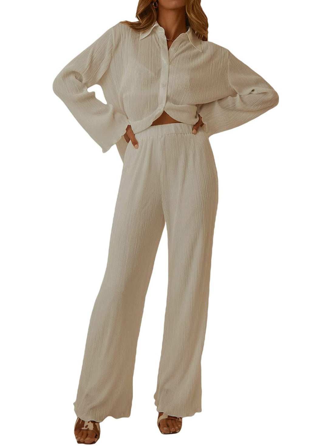 Stylish Collared Neck Long Sleeve Top and Pants Lounge Set featuring a buttoned design in a soft, opaque fabric. The two-piece ensemble is displayed on a neutral background, showcasing its chic and comfortable style, perfect for lounging or casual outings.