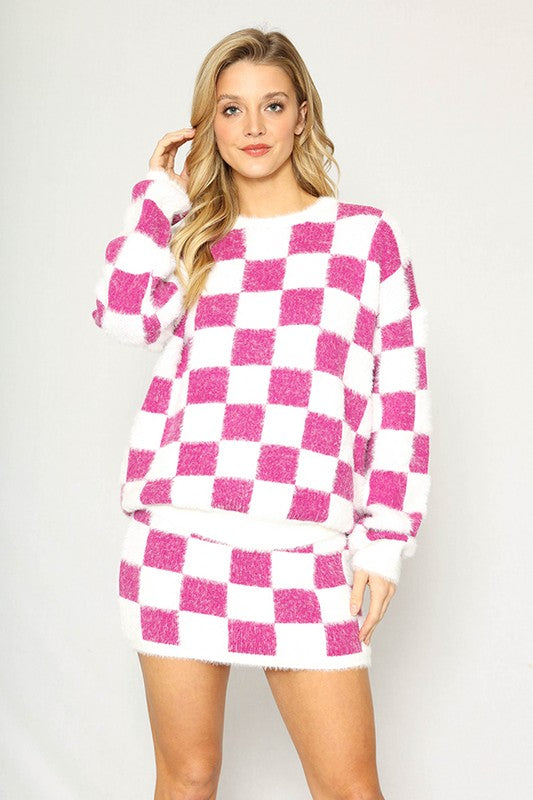 Model wearing Unique Kulture luxury fuzzy checkered sweater

 bright purple 