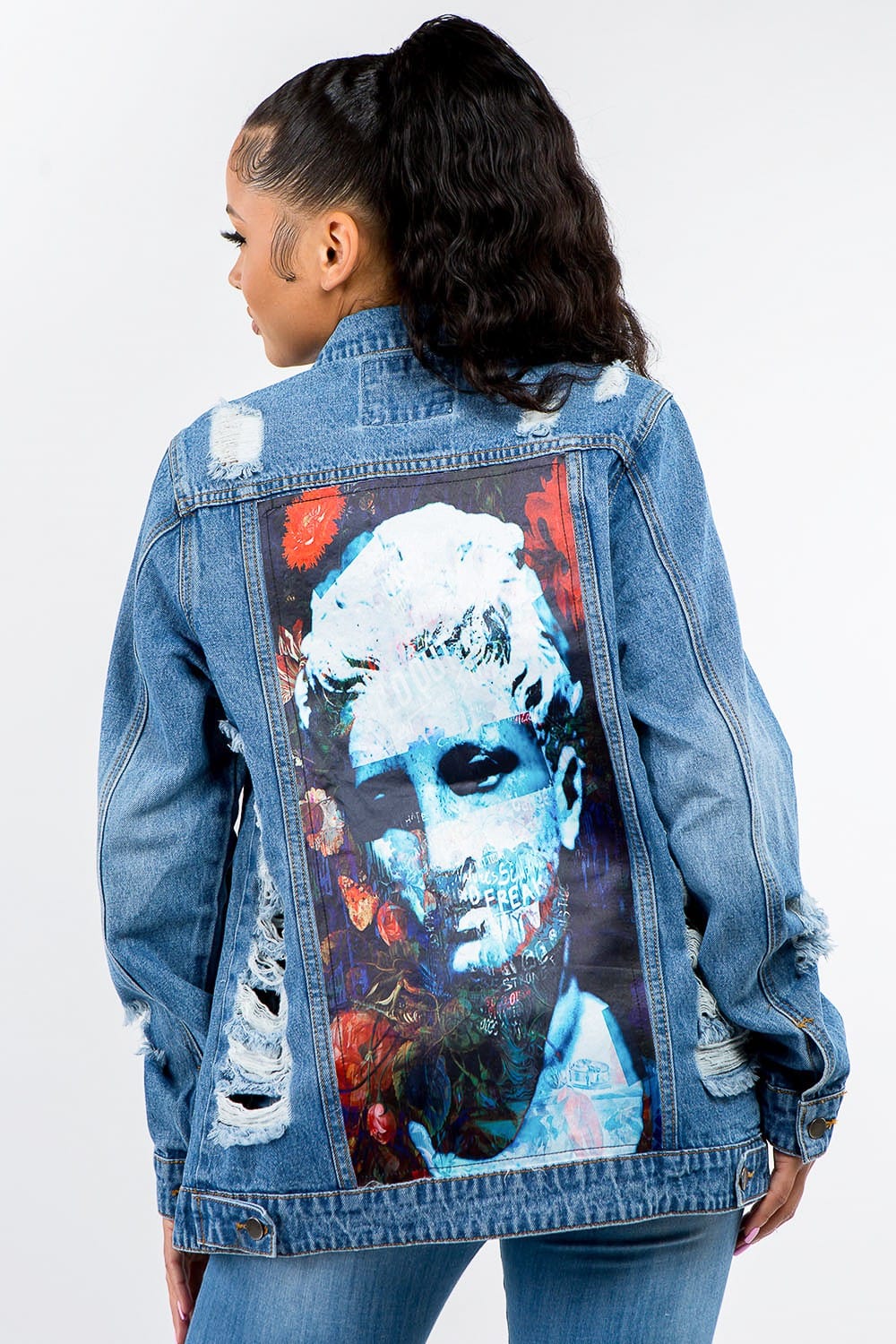 Front view of the Unique Kulture American Bazi Full Size Button Up Distressed Denim Jacket, featuring a stylish distressed design, classic button-up closure, and a relaxed fit. The jacket showcases a vintage look with washed detailing, perfect for layering over casual outfits