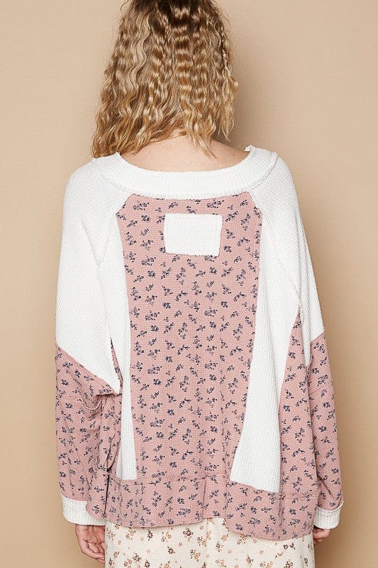 Waffle Knit Floral Notched Long Sleeve Top featuring a cozy waffle knit texture, a beautiful floral pattern, and a modern notched neckline, perfect for layering or wearing as a statement piece.



