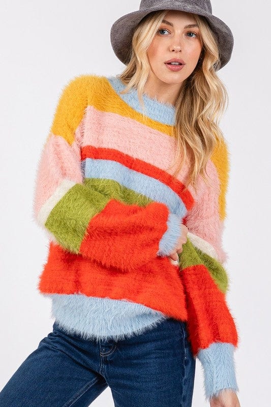 Color Block Round Neck Dropped Shoulder Sweater featuring a vibrant color block design, displayed on a mannequin against a neutral background, showcasing its relaxed fit and stylish appeal."