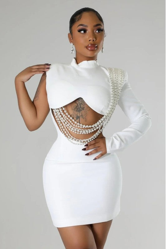 
                  
                    Model wearing Unique Kulture luxury one-shoulder mini party dress with long sleeve and cut-off detail


                  
                