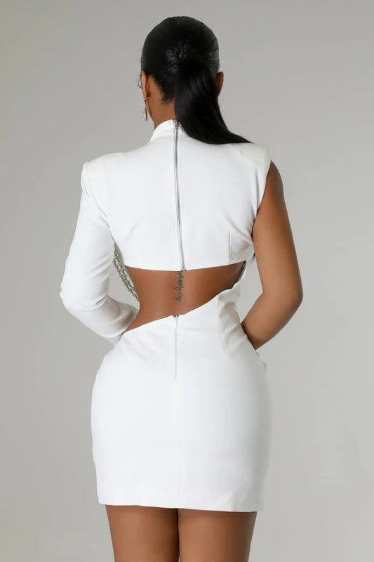 
                  
                    Model wearing Unique Kulture luxury one-shoulder mini party dress with long sleeve and cut-off detail

 back view
                  
                