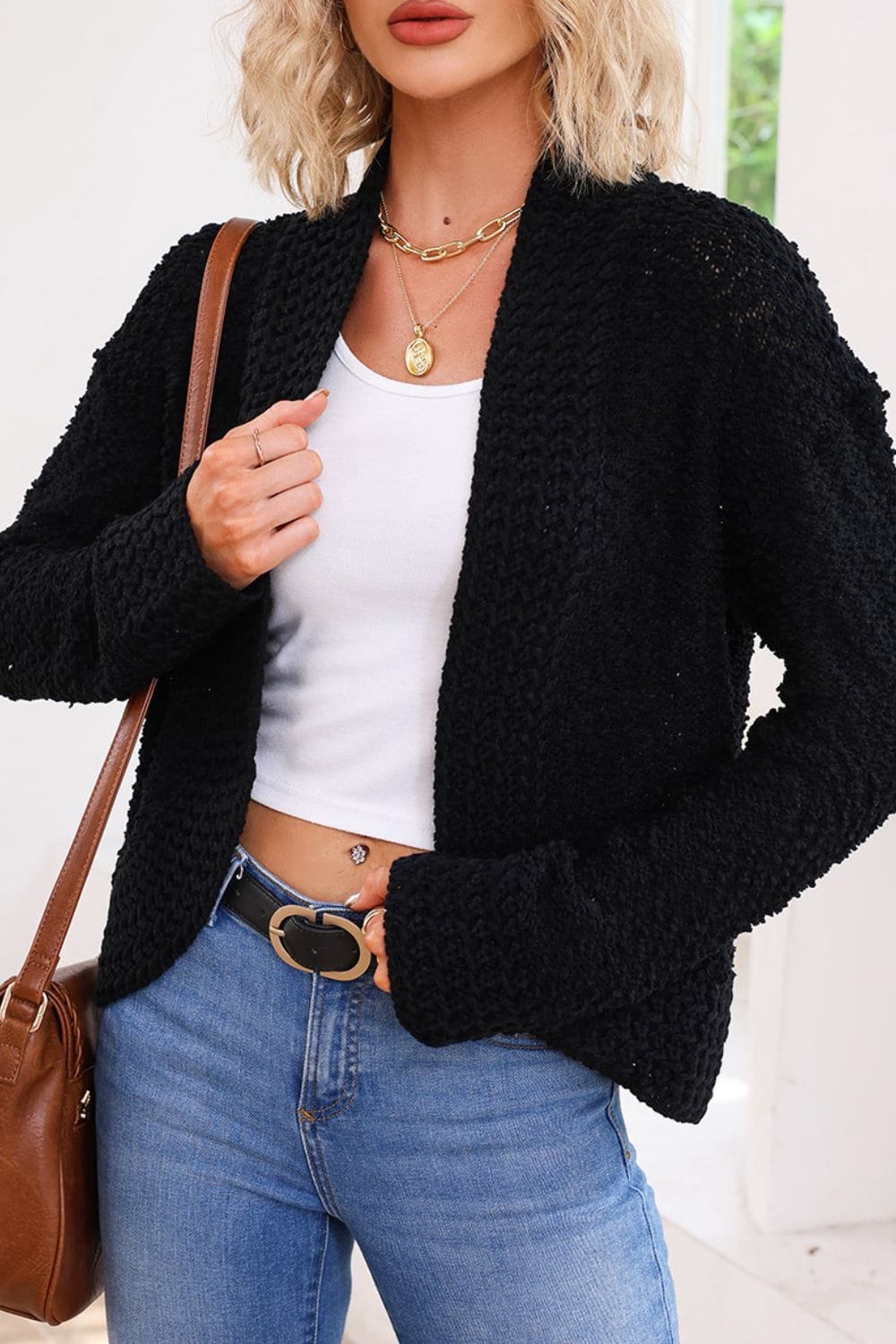 : "Solid Color Open Front Cardigan featuring a relaxed open front design, slightly stretchy fabric, and available in various classic solid colors, perfect for layering in casual and stylish outfits.