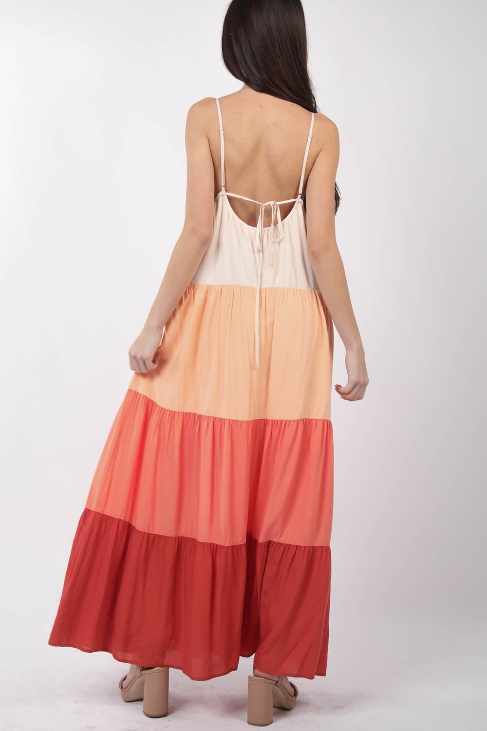  A color block tiered maxi cami dress by Unique Kulture, showcasing vibrant hues and flattering silhouette for a chic summer look."