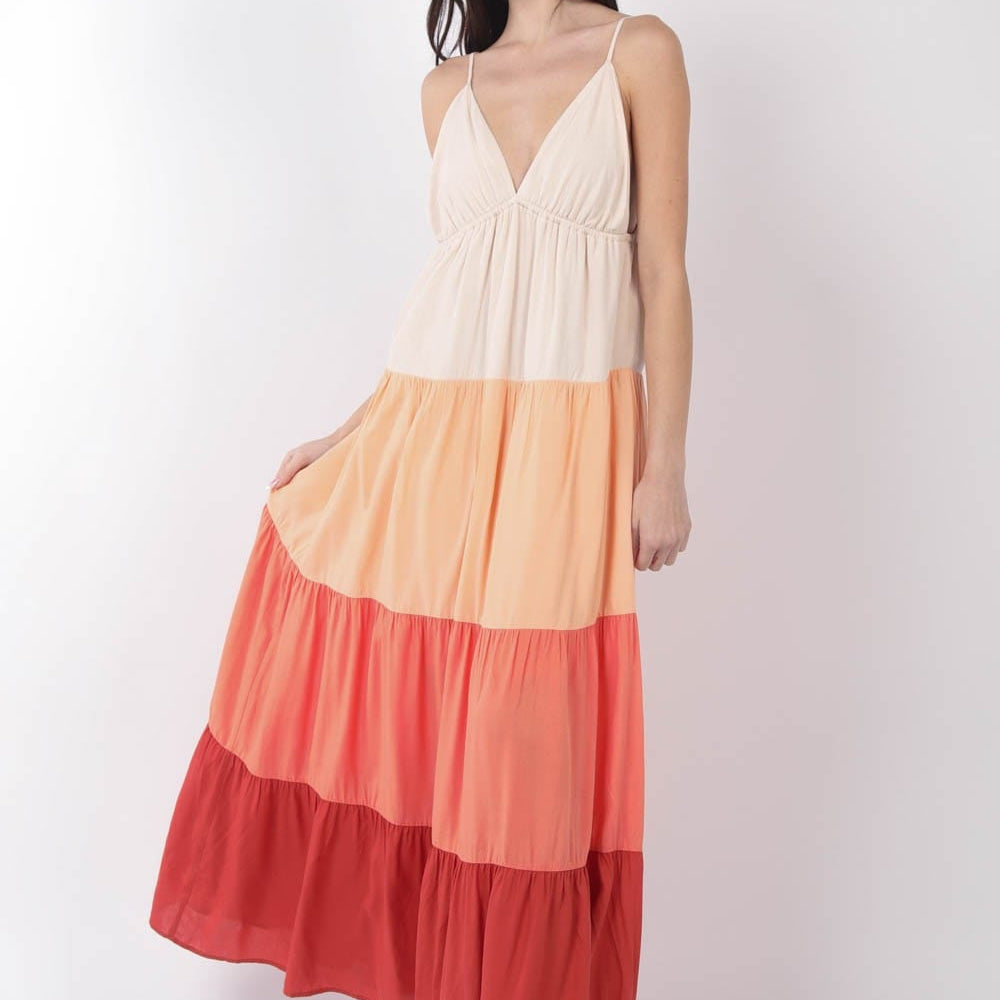  A color block tiered maxi cami dress by Unique Kulture, showcasing vibrant hues and flattering silhouette for a chic summer look."