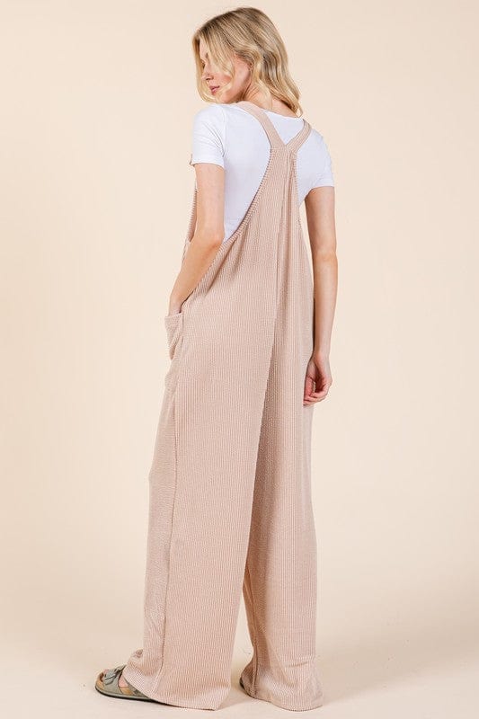 "BOMBOM Knot Straps Wide Leg Ribbed Overalls with Pockets displayed on a mannequin, showcasing the trendy knot straps, wide-leg design, and ribbed texture against a neutral background."