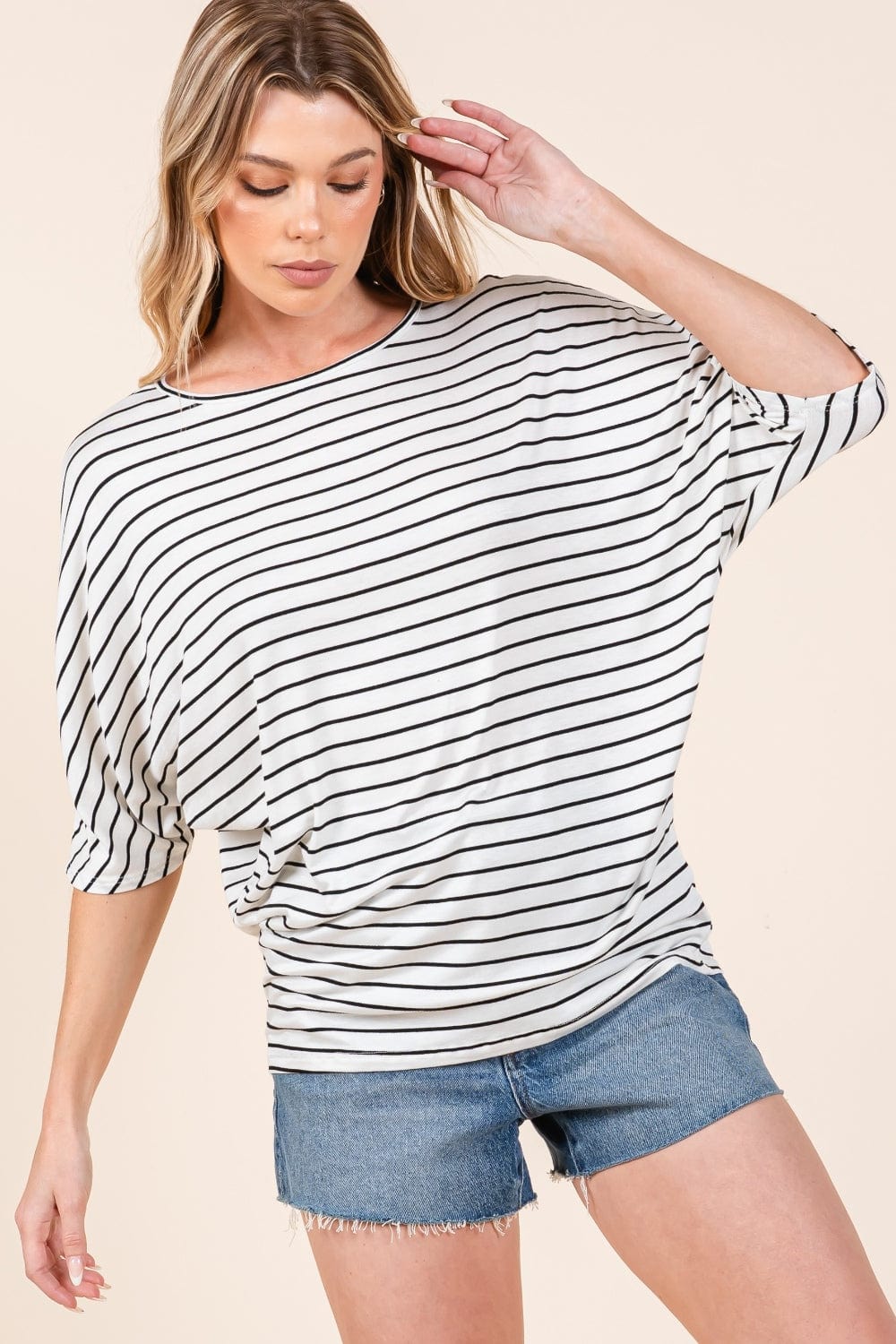 Front view of the BOMBOM Striped Boat Neck Dolman Sleeve Top, featuring a classic striped pattern and a flattering boat neckline. The top showcases stylish dolman sleeves and a relaxed fit, made from opaque fabric with a slightly stretchy texture. Perfect for casual and versatile styling
