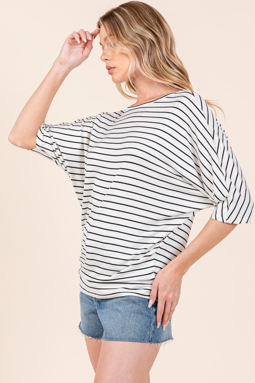 Front view of the BOMBOM Striped Boat Neck Dolman Sleeve Top, featuring a classic striped pattern and a flattering boat neckline. The top showcases stylish dolman sleeves and a relaxed fit, made from opaque fabric with a slightly stretchy texture. Perfect for casual and versatile styling
