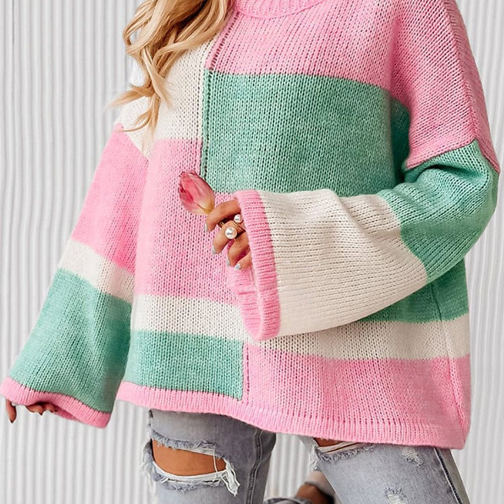 "Color Block Round Neck Drop Shoulder Sweater featuring a vibrant color block design, displayed on a mannequin against a neutral background, showcasing its relaxed fit and modern style."
