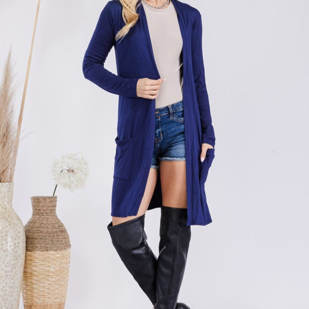  Celeste Full Size Open Front Cardigan with Pockets, featuring a stylish and versatile open-front design in a solid color. The cardigan is made from a highly stretchy fabric blend, showcasing its comfortable fit and functional pockets, perfect for layering over various outfits.
