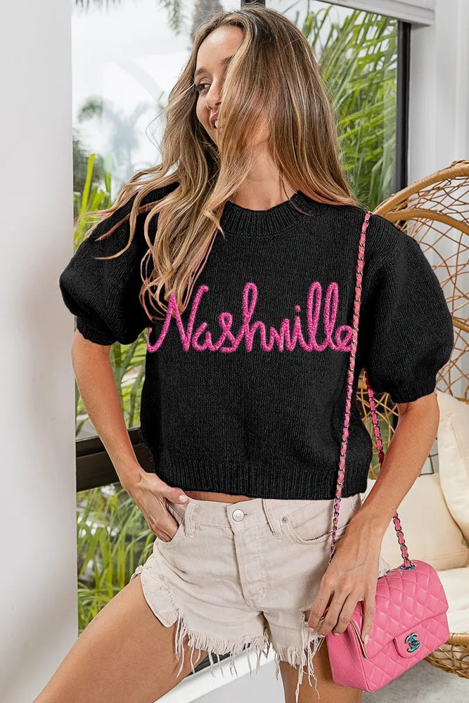 Woman wearing a BiBi Metallic Letter Short Puff Sleeve Hairy Sweater with shimmering metallic letters and fuzzy texture, styled for a trendy, cozy statement look.

-Max-Origin