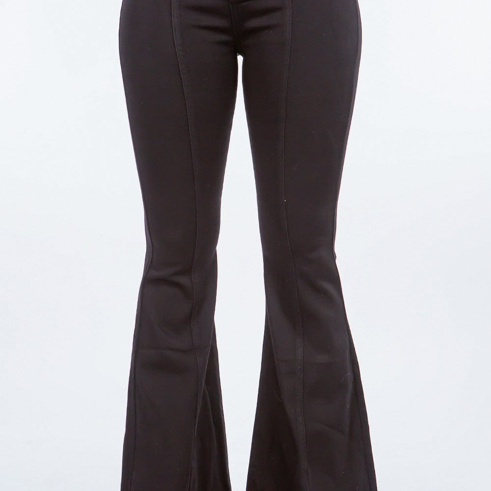 American Bazi High Waist Pull On Flare Jeans showcased on a model, featuring a flattering high waist design and a stylish flare leg, paired with a casual top, set against a bright, neutral background