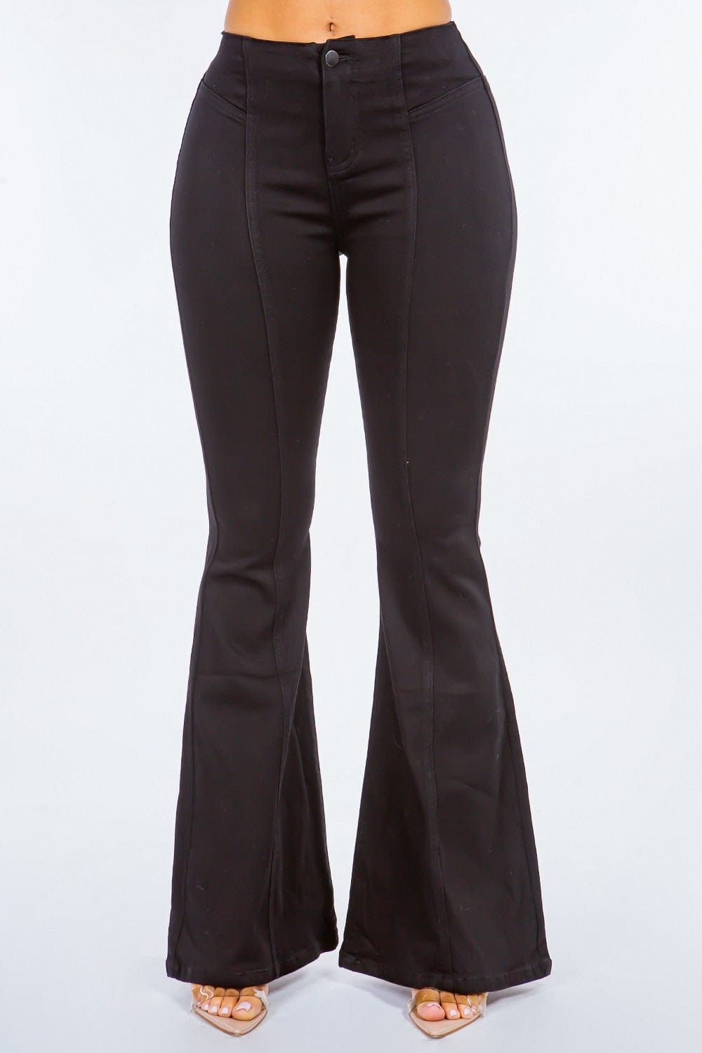 American Bazi High Waist Pull On Flare Jeans showcased on a model, featuring a flattering high waist design and a stylish flare leg, paired with a casual top, set against a bright, neutral background