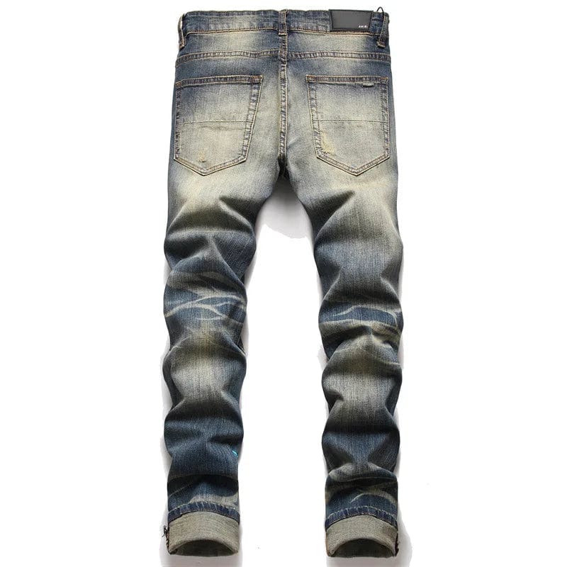 A pair of Unique Kulture Luxury Jeans, showcasing a sleek silhouette and refined design. Made from premium-quality denim, these jeans feature intricate bespoke stitching, artisanal embroidery, and exclusive hardware. The luxurious fabric provides a soft, comfortable fit, embodying both elegance and sophistication.