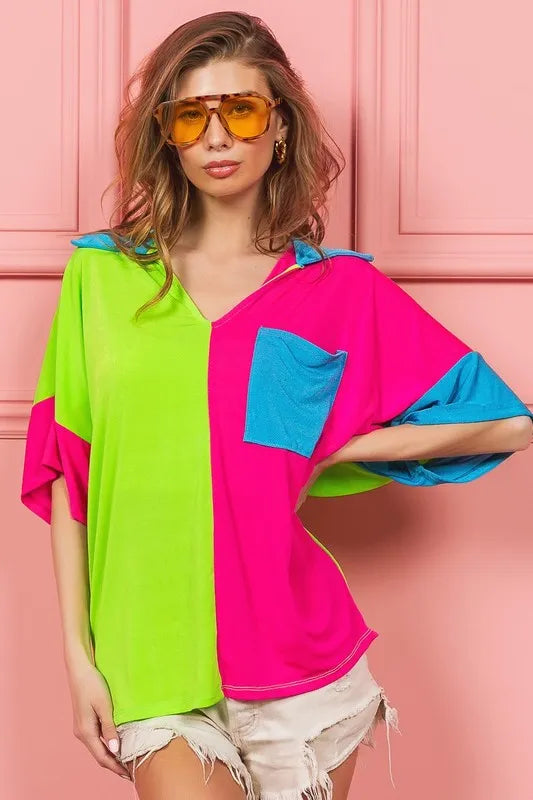 Woman wearing a BiBi Slinky Knit Color Block V Neck Top with oversized fit and pocket detail, in bold modern colors, perfect for casual or dressy occasions.

4
