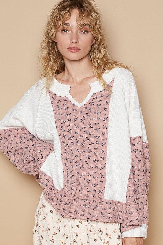 Waffle Knit Floral Notched Long Sleeve Top featuring a cozy waffle knit texture, a beautiful floral pattern, and a modern notched neckline, perfect for layering or wearing as a statement piece.