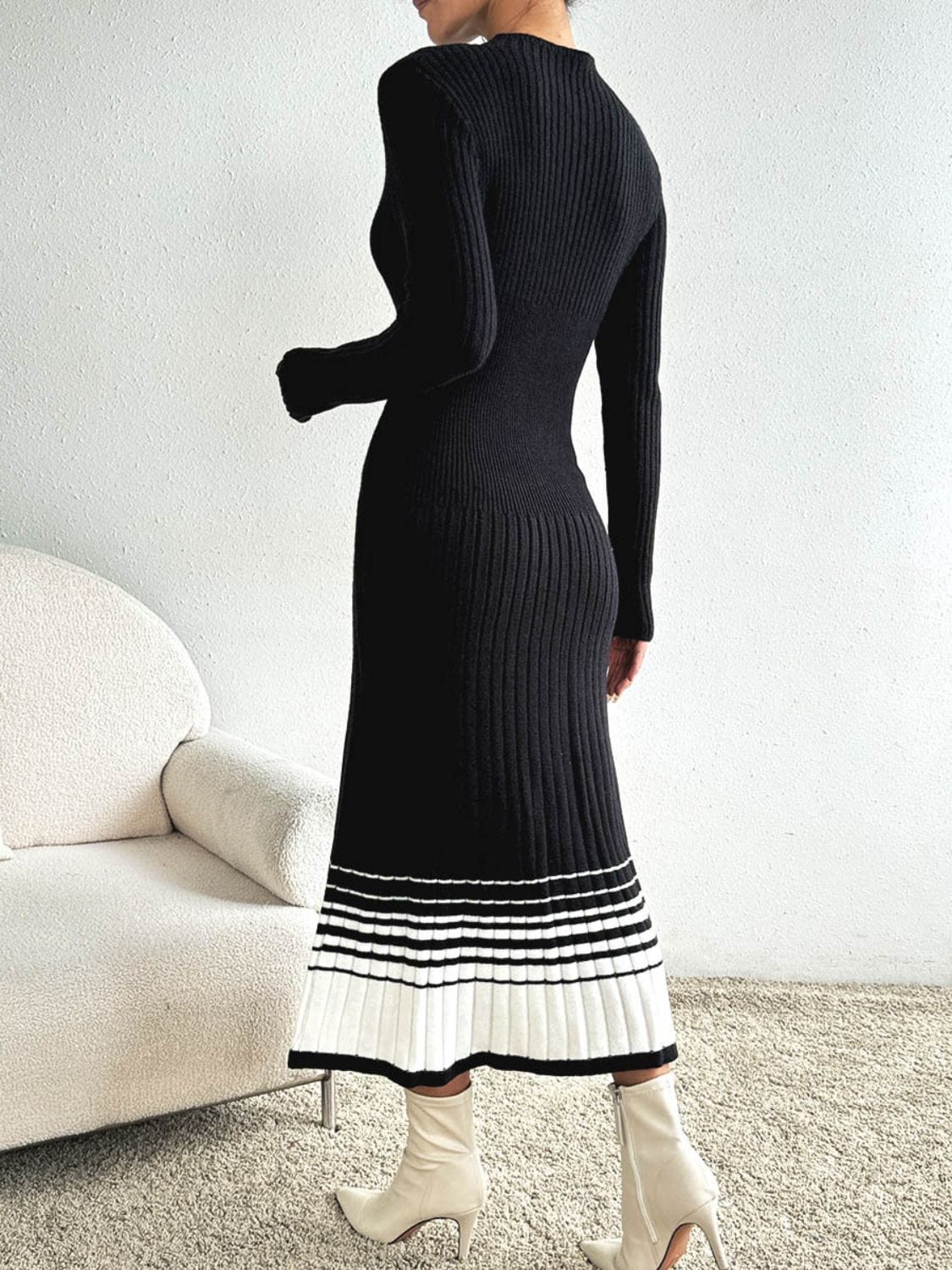 Front view of the Unique Kulture Contrast Mock Neck Long Sleeve Sweater Dress, featuring a stylish mock neck design, long sleeves, and a cozy sweater material. The dress showcases a modern silhouette with contrast detailing, perfect for casual outings and cooler weather