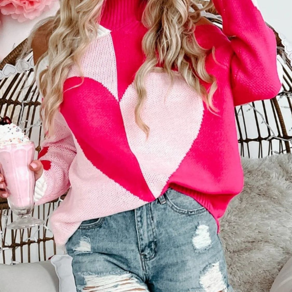 "Valentine's Day Heart Turtleneck Cold Shoulder Sweater featuring a stylish cold shoulder design, cozy turtleneck, and a playful heart pattern, displayed on a mannequin against a soft background."
Related
