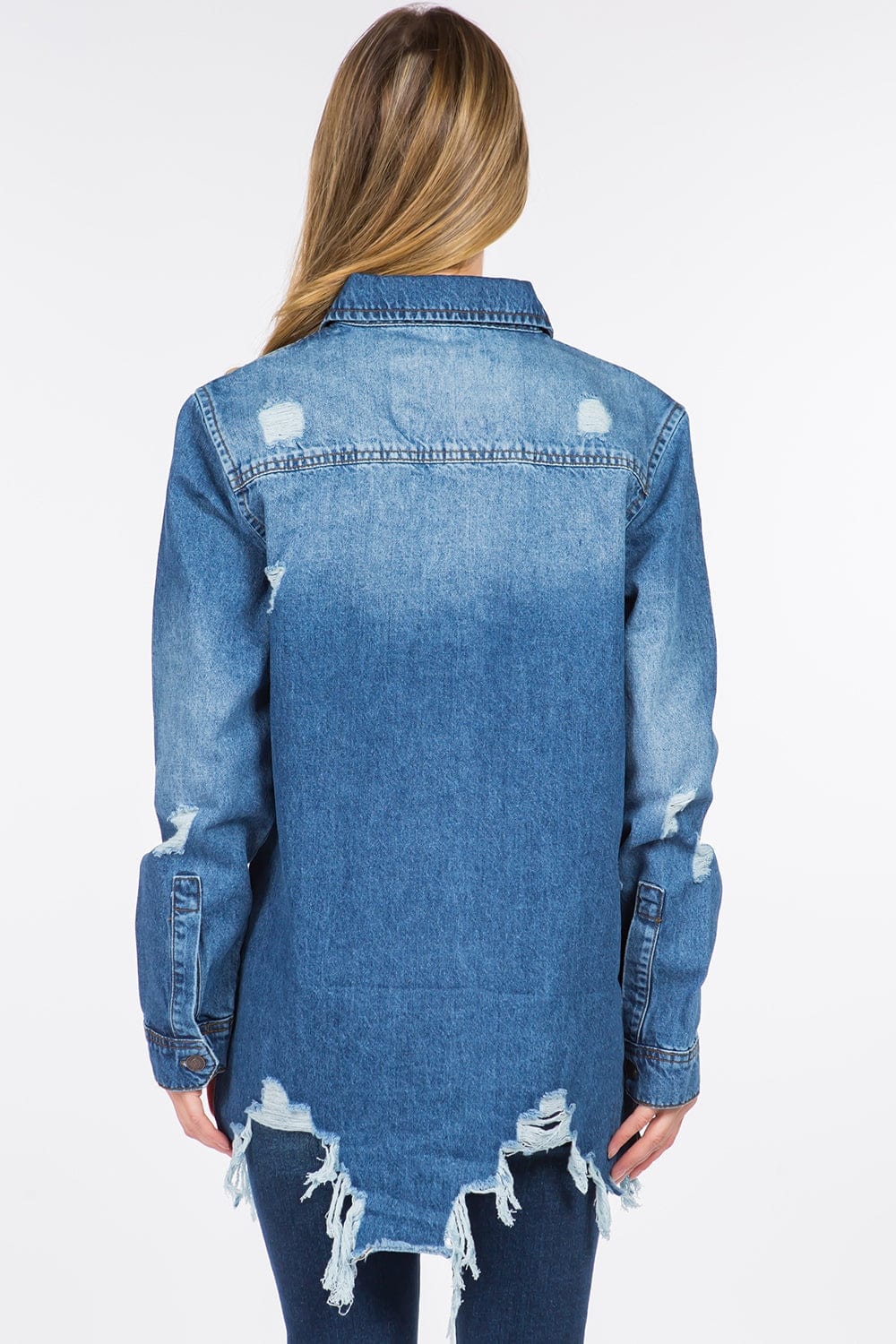 back view Unique Kulture Distressed Frayed Hem Denim Jacket featuring a classic denim silhouette with distressed detailing and a raw frayed hem. The jacket is shown in a stylish, casual setting, highlighting its edgy design and versatility for layering over various outfits
