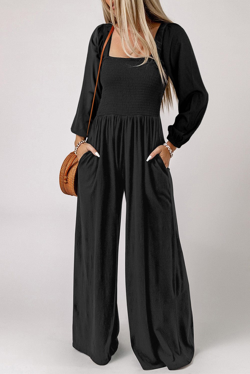 "Discover the chic and comfortable Unique Kulture Square Neck Raglan Sleeve Jumpsuit with Pocket. This stylish jumpsuit features a square neckline, trendy raglan sleeves, and a convenient pocket. Perfect for any occasion, this jumpsuit blends fashion and functionality effortlessly."