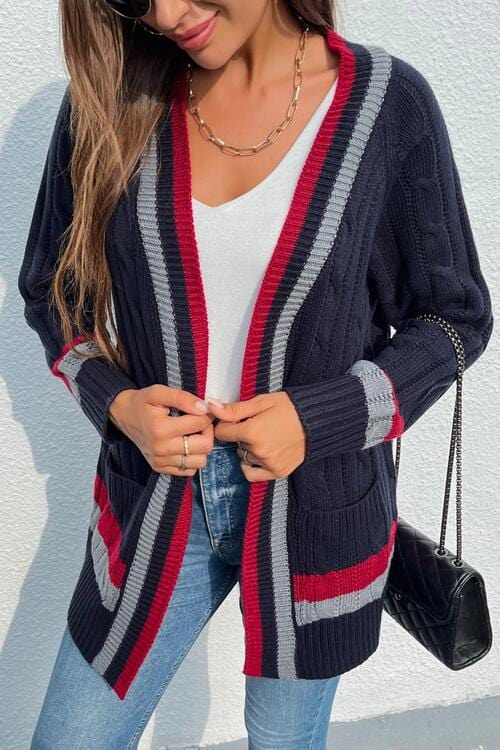 Certainly! Here's an example of alt text for an image of an open front striped long sleeve cardigan:  "Striped long sleeve cardigan with an open front design, featuring a stylish pattern in [describe colors]. The cardigan is draped elegantly, showcasing its relaxed fit and comfortable style."