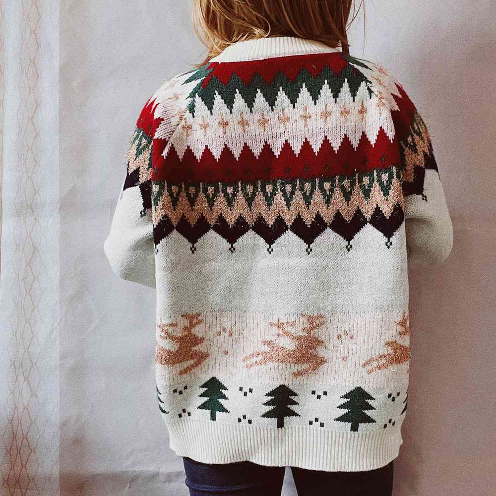 A close-up image of a Unique Kulture Christmas Element Long Sleeve Sweater, featuring festive holiday patterns and vibrant colors, perfect for celebrating the holiday season in style.