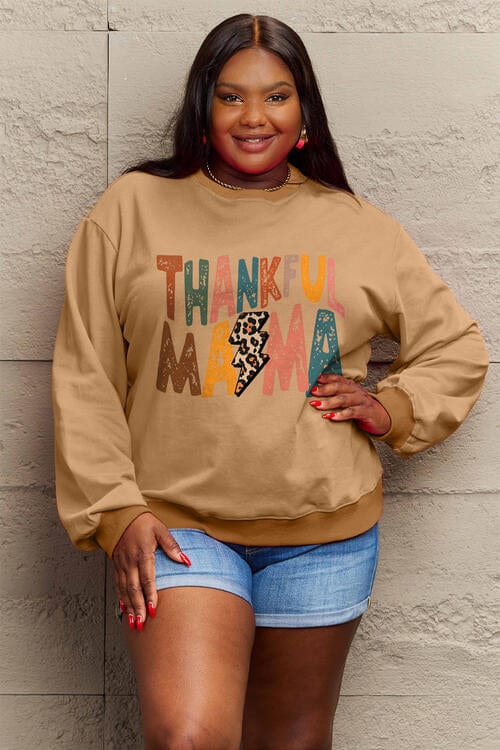 "An image of a Simply Love Full Size Letter Graphic Long Sleeve Sweatshirt from Unique Kulture's Thanksgiving holiday collection. The sweatshirt features a bold and stylish design with Thanksgiving-themed graphics, showcasing a festive and unique style for the holiday season."