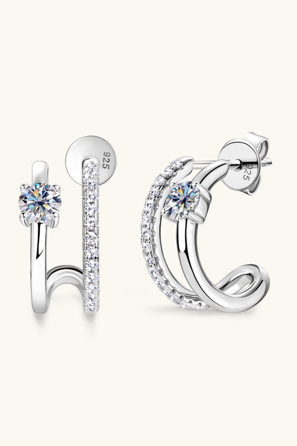 "Close-up image of Moissanite 925 Sterling Silver C-Hoop Earrings. These elegant earrings feature C-shaped hoops made from high-quality 925 sterling silver, adorned with sparkling Moissanite gemstones, creating a sophisticated and timeless jewelry piece."
