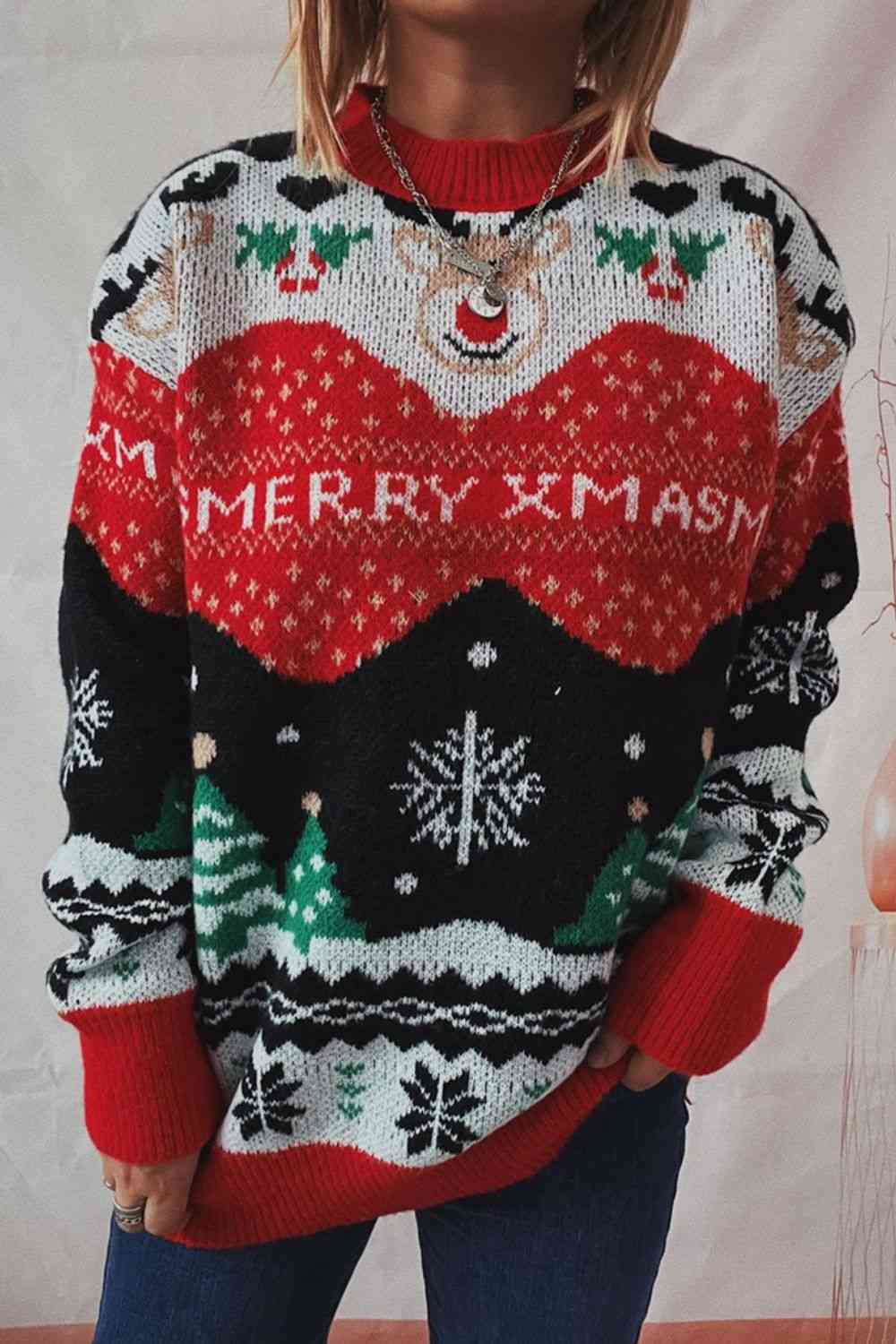 "Image of a Unique Kulture Christmas Element Long Sleeve Sweater in festive red and green colors. The sweater features intricate patterns of snowflakes, reindeer, and Christmas trees, creating a cheerful and holiday-themed design. Perfect attire for celebrating the festive season in style."