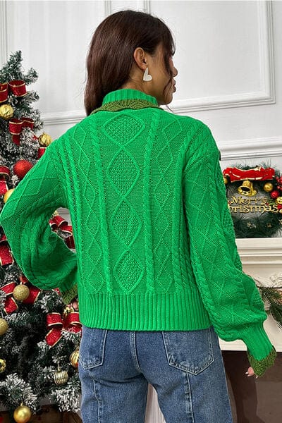 "Image: A cozy cable-knit sweater featuring a stylish ruffled mock neck and lantern sleeves. The intricate cable pattern adds texture to the sweater, creating a warm and fashionable look for cooler seasons.""Image: A cozy cable-knit sweater featuring a stylish ruffled mock neck and lantern sleeves. The intricate cable pattern adds texture to the sweater, creating a warm and fashionable look for cooler seasons."