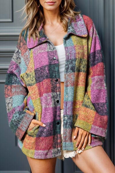 "Alt text: A stylish Plaid Pocketed Snap Down Jacket from Unique Culture Designr, featuring a distinctive design with a blend of vibrant colors and patterns. The jacket includes practical pockets and a snap-down closure, making it a fashionable and functional addition to any wardrobe."