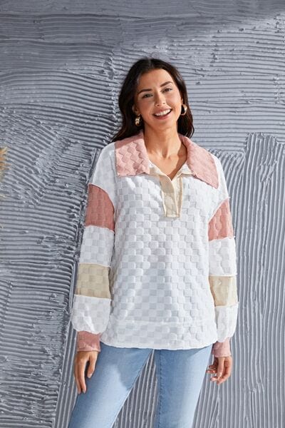 "Alt text for an image of a Color Block Exposed Seam Collared Neck Blouse: A stylish blouse featuring color-blocking patterns with exposed seams. The collared neck adds a sophisticated touch, highlighting the garment's fashionable design and attention to detail."