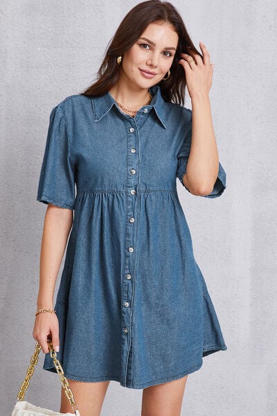 Unique Kulture Button Up Collared Neck Tiered Denim Dress: A stylish denim dress with a button-up front, featuring a collared neck and tiered design. The dress combines fashion and comfort, making it a versatile and trendy wardrobe choice