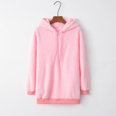 Drawstring Teddy Hoodie. The hoodie features a cozy, teddy bear-like texture and a quarter-zip design with a drawstring hood. The rich, earthy color palette and stylish detailing make it a fashionable and comfortable choice for cooler weather.