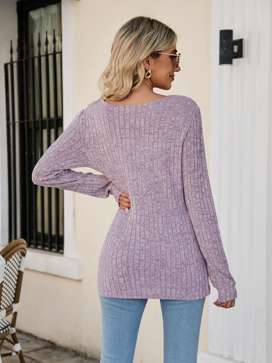 "An image of a person wearing the Unique Kulture Square Neck Ribbed Long Sleeve T-Shirt. The shirt is made from ribbed fabric and features a square neckline. The long sleeves provide a snug fit, while the overall design exudes a sense of modern fashion with a touch of uniqueness."