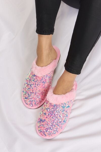 Unique Kulture Forever Link Sequin Plush Round Toe Slippers - Luxurious and stylish slippers adorned with sequins for a touch of glamour. Enjoy ultimate comfort with plush lining and a round toe design. Elevate your relaxation with these fashionable slippers