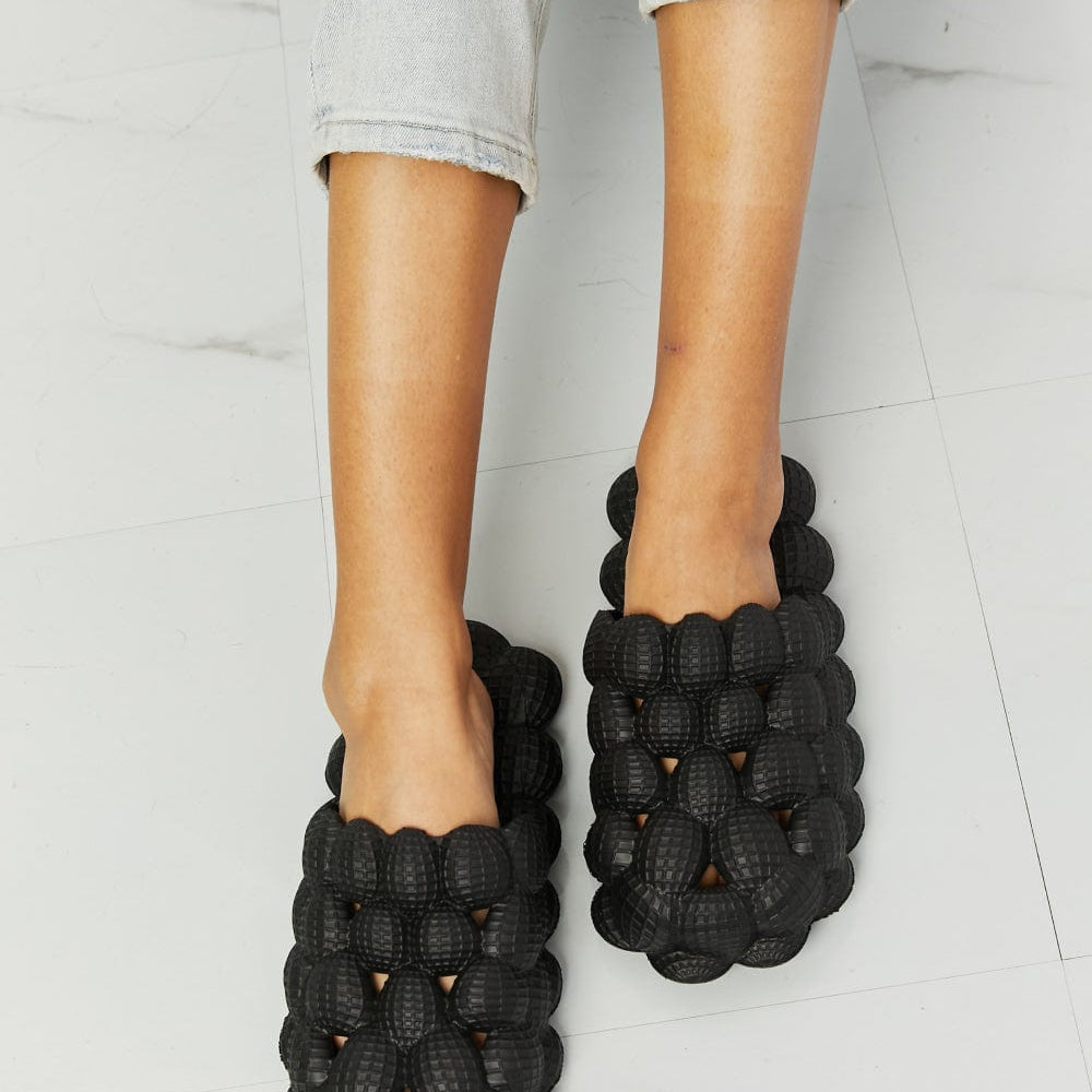 Bubble slides Unique Kulture footwear Designer slides Fashionable sandals Trendy bubble design Stylish slides Comfortable footwear Bubble sole slides Contemporary fashion slides Summer sandals Footwear for casual wear Statement slides Bubble-inspired design Fashion-forward footwear Slide sandals Chic designer slides Unique Kulture collection Bubble-textured slides Elevated slide sandals Versatile fashion slides